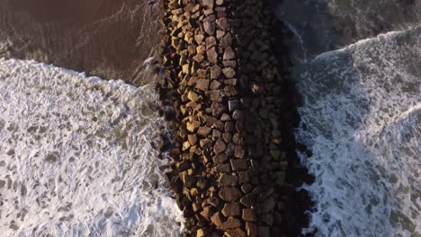 breakwater at sunset, mar del plata in argentina