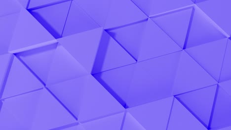 abstracto 3d geométrico triángulo púrpura animación de pared. 4k imágenes de renderización por computadora. bucle.
