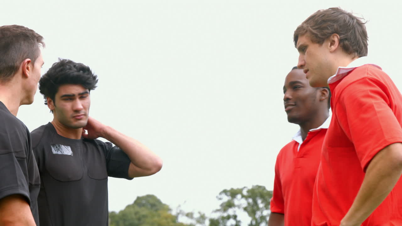 Rugby players talking to each other
