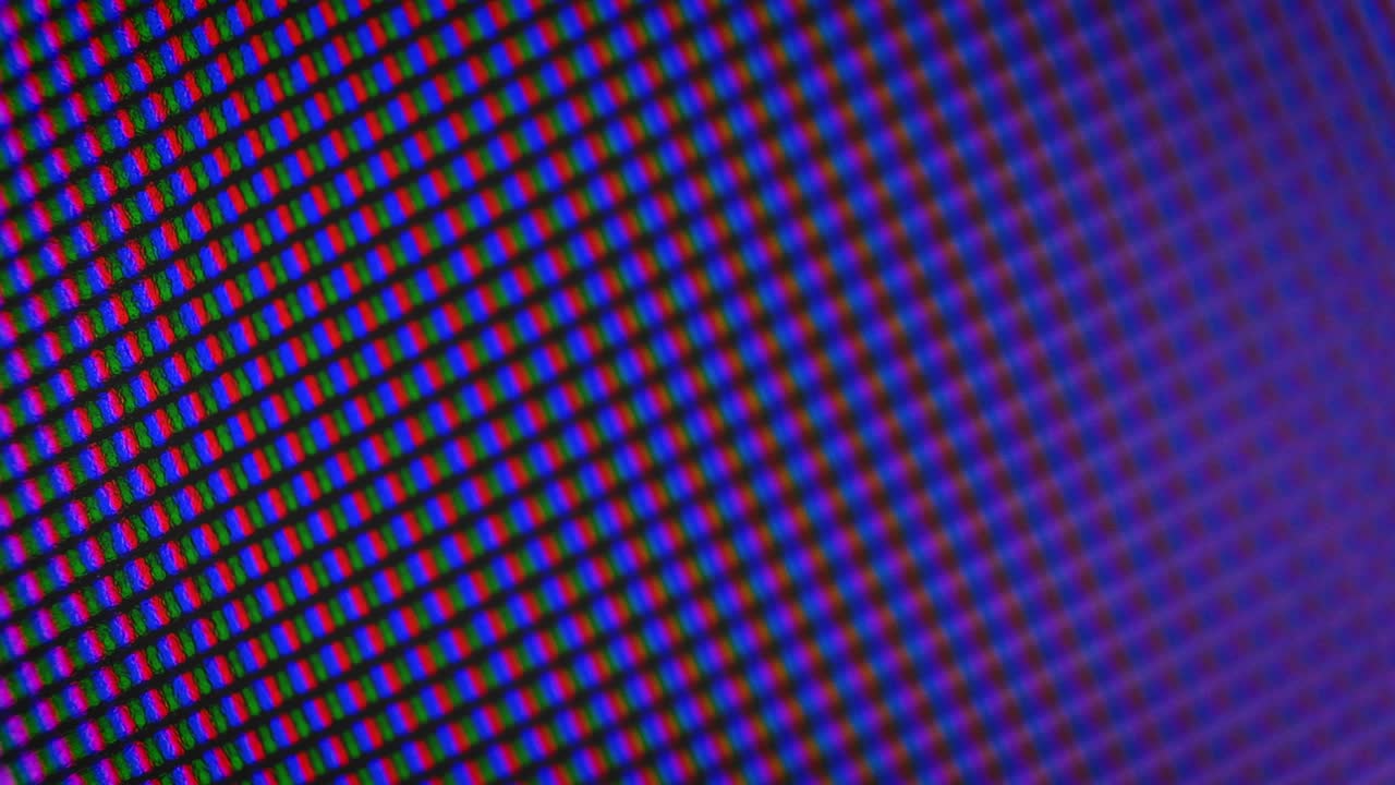 Bagliore astratto multicolore e fluido di pixel RGB in primo piano