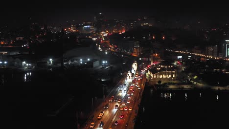 flying above highway bridge in istanbul between beyoglu and eminönü districts at night