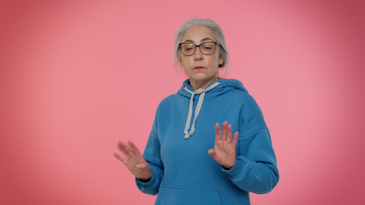 Confused senior old granny woman pointing fingers himself ask say who me no thanks i do not need it