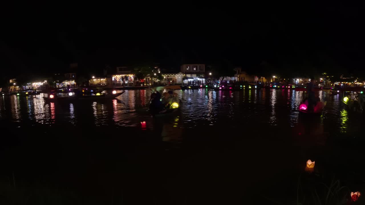 Hoi An’s nightly glow, the lanterns sway, casting colours along the bay, timelapse