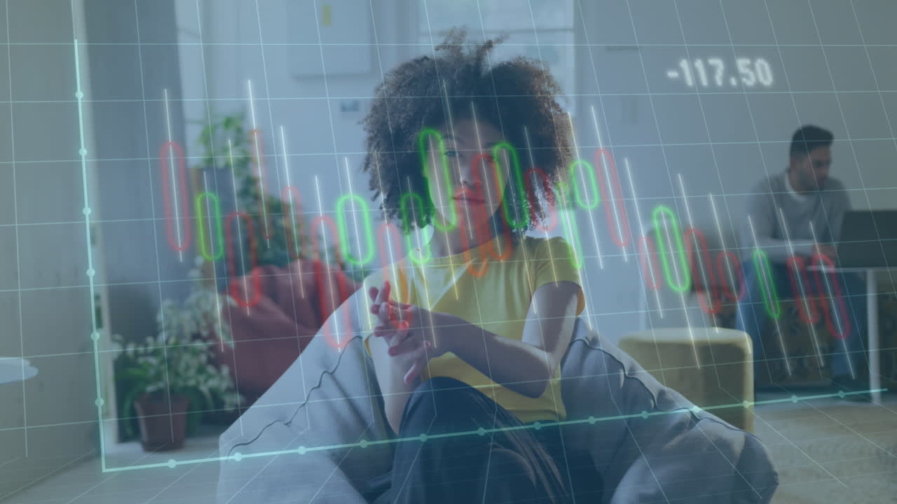 Animation of financial data processing over biracial businesswoman working in office