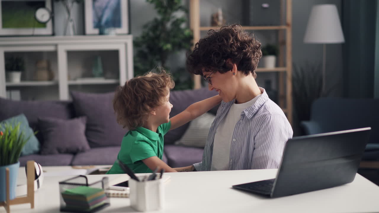 Mother and Child Studying Together at Home