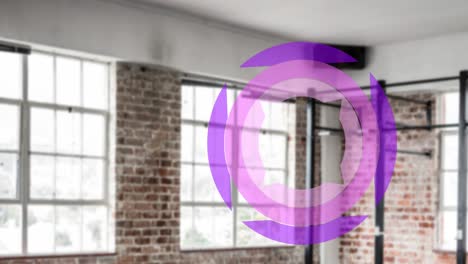 Animation-of-purple-circles-spinning-over-industrial-gym-interiors