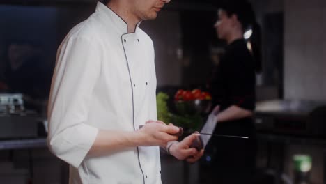 chef preparing food in a restaurant kitchen