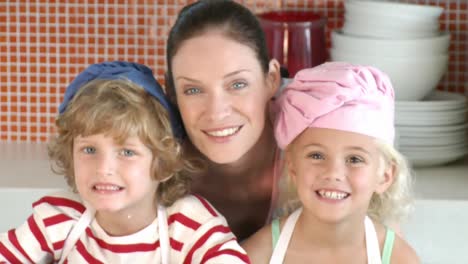 mother with her children in the kitchen