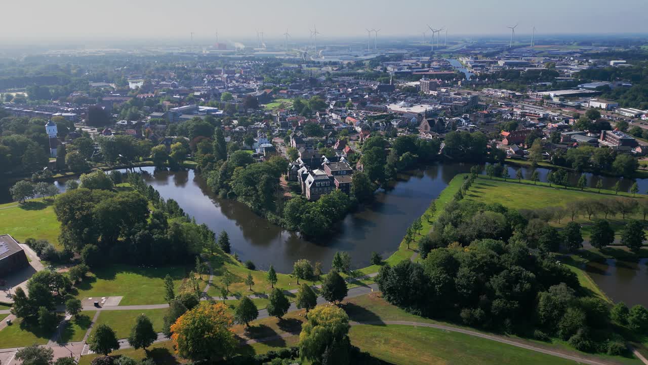 Aerial View of a City with Castle and Wind Turbines