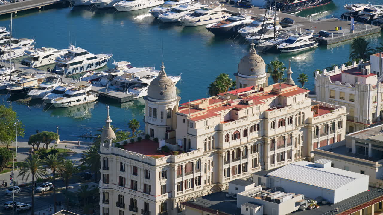 View of Casa Carbonell's domes overlooking the yacht marina in Alicante, Spain