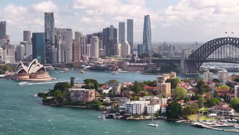 stunning aerial view of sydney skyline, opera house, and harbour bridge