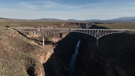 aerial view of a bridge spanning a canyon