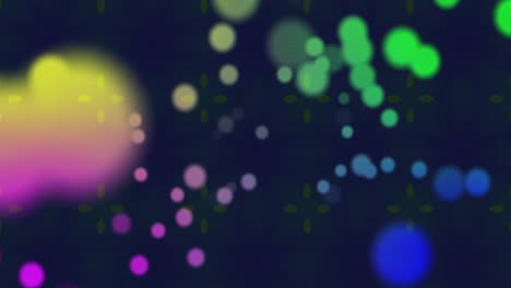 animation of colorful lights blinking on black background