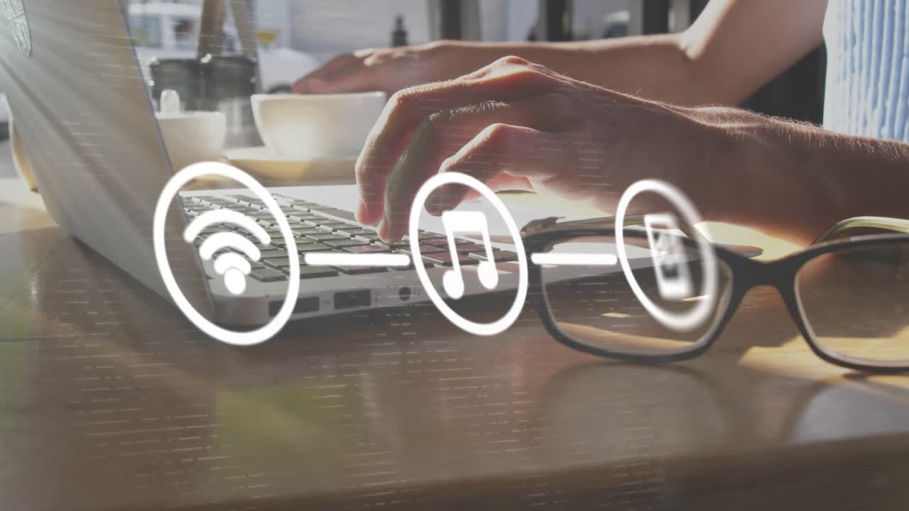 Hands typing on laptop revealing swirling wifi, music, phone icons pulsing to show network link