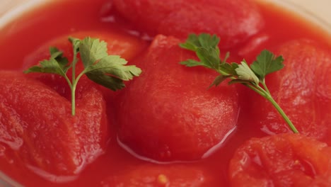 close up of preserved tomatoes in a bowl