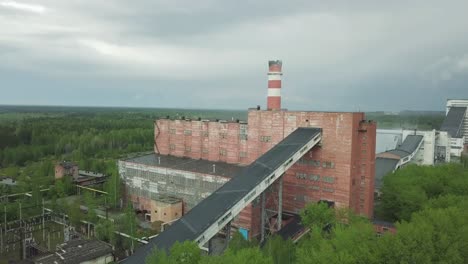 abandoned power plant in the woods