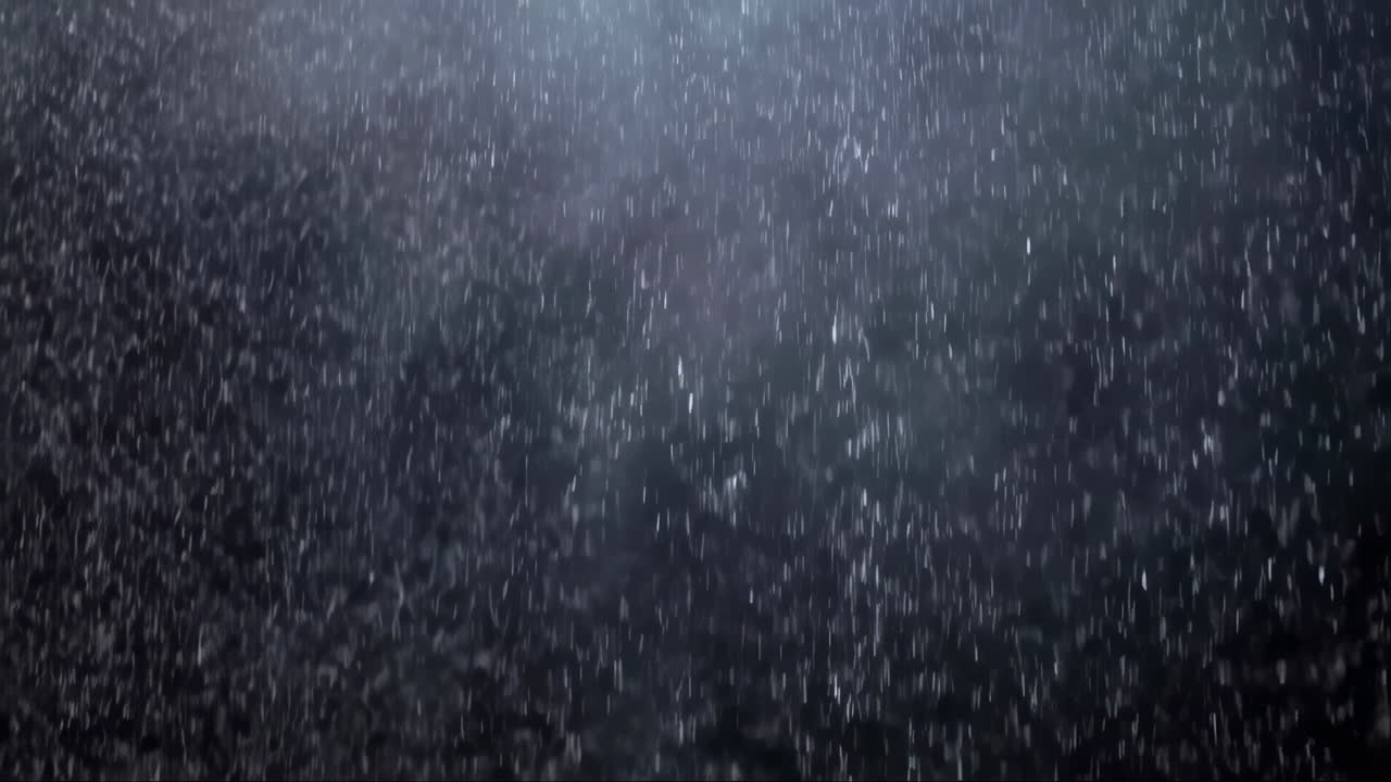 Heavy Rain Falling Against a Dark Background