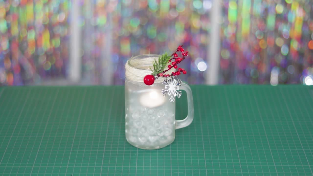 decoraciones de frascos de piedra con temática navideña