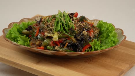 spicy stir-fried pork with onions and scallions, glazed in a rich gochujang sauce. 매콤한 돼지고기와 양파, 파가 고추장 소스에 어우러진 볶음 요리.