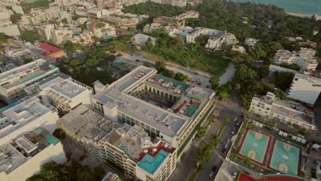 stunning aerial drone shot over city, showing roof deportivo