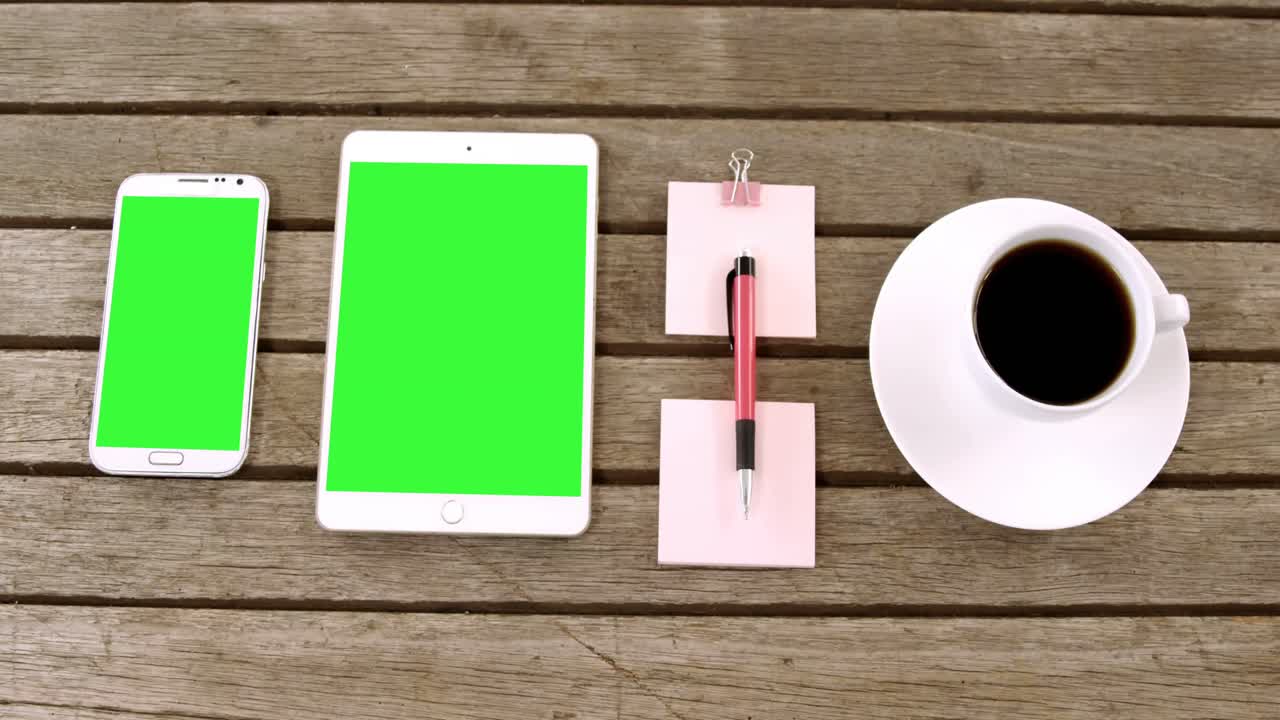 Digital tablet, mobile phone, coffee, pen and sticky note on table 4k