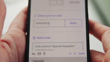 entering a promo code on a mobile app