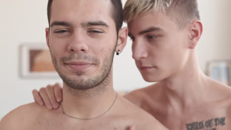 portrait of lovers standing indoors