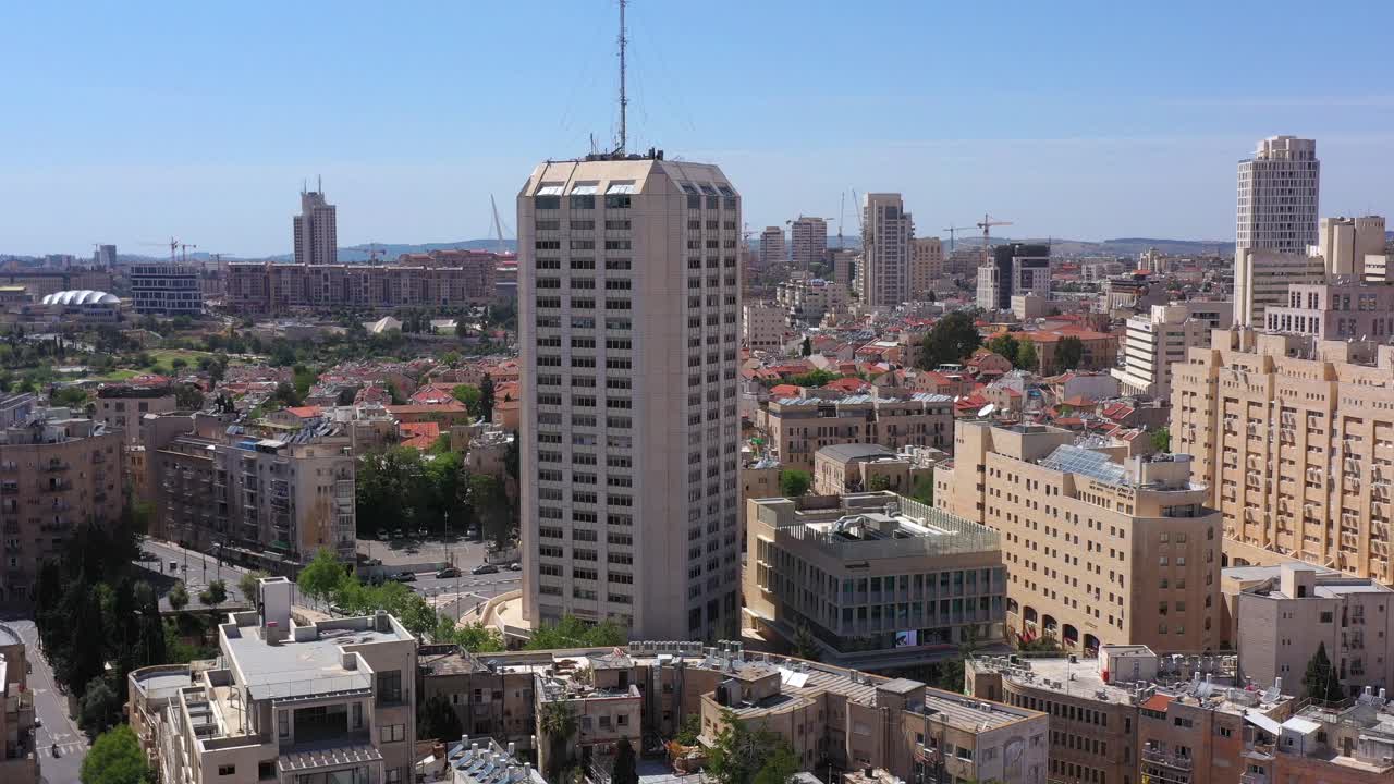 Aerial View of a Cityscape with a Prominent Skyscraper