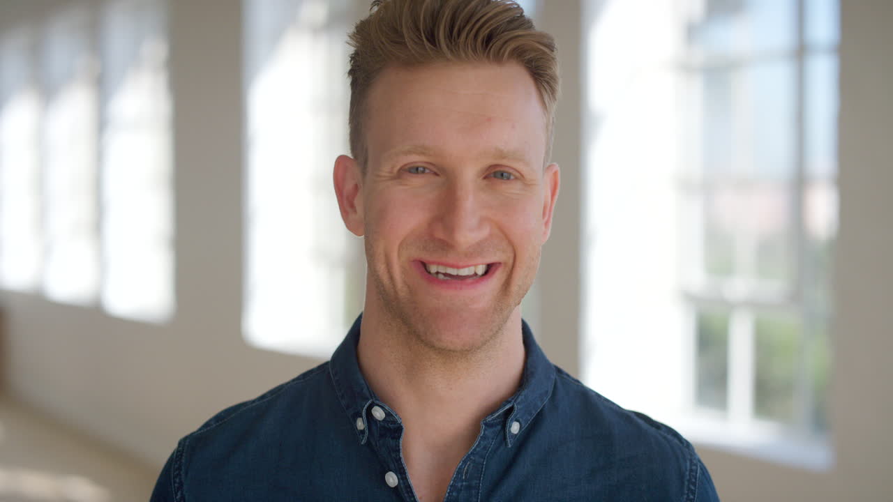Face portrait of a handsome business man smiling