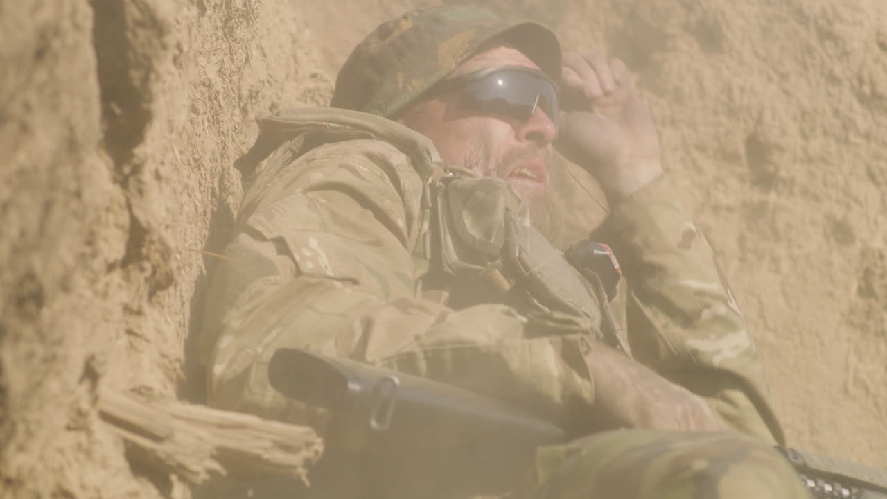 Military personnel in a desert environment