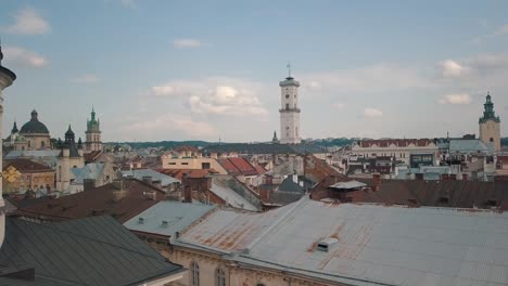 Aerial-drone-video-of-european-city-Lviv,-Ukraine.-Rynok-Square,-Central-Town-Hall,-Dominican-Church