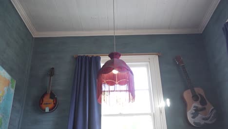 indoor scenes featuring windows, curtains, and furniture