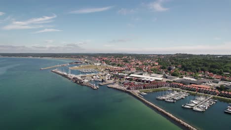 drone view of costal town and harbor full of yachts sailboats and vessels