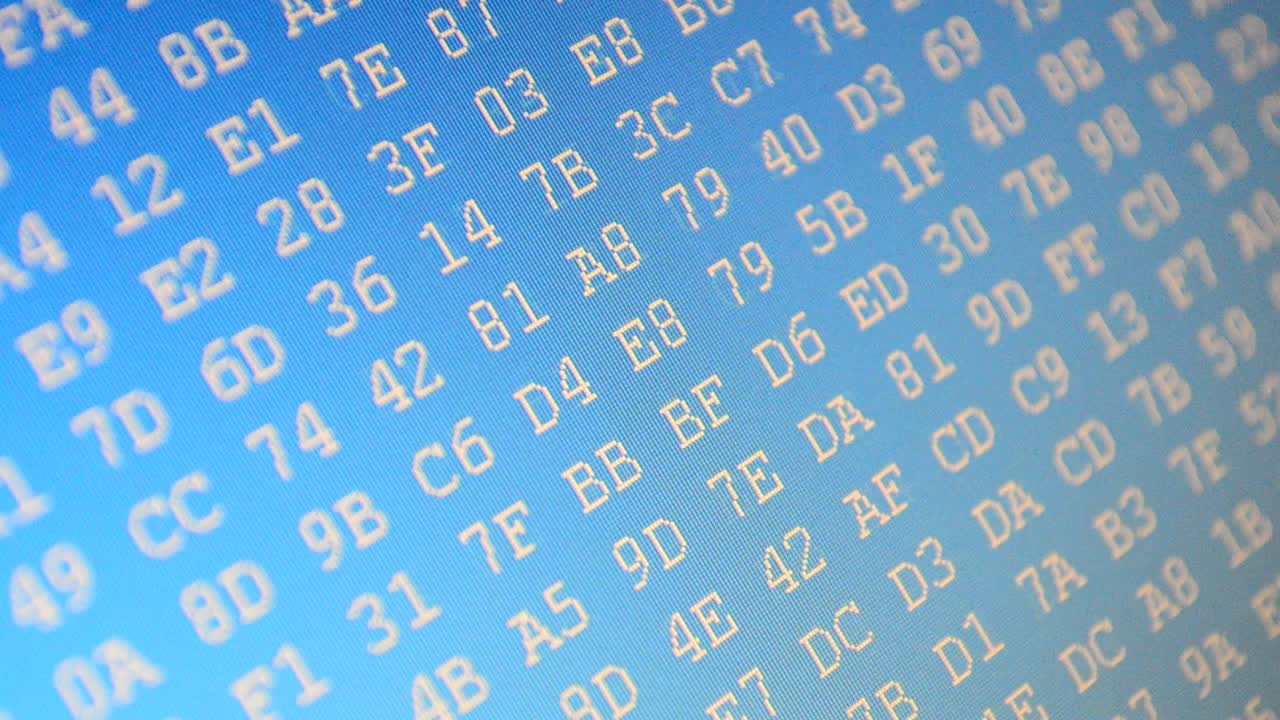 Shooting of a binary code. Code on a blue background. Hexadecimal program code on screen. Animated background of moving binary code numbers