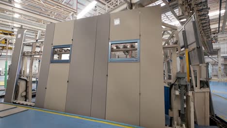 factory manufacturing of wall panels: industrial assembly line process