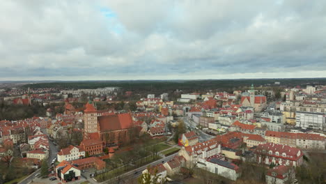 historic polish town of olsztyn with old town and buildings at cloudy day