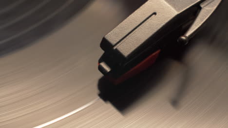 slider move on a spinning vinyl music album playing on a retro record player