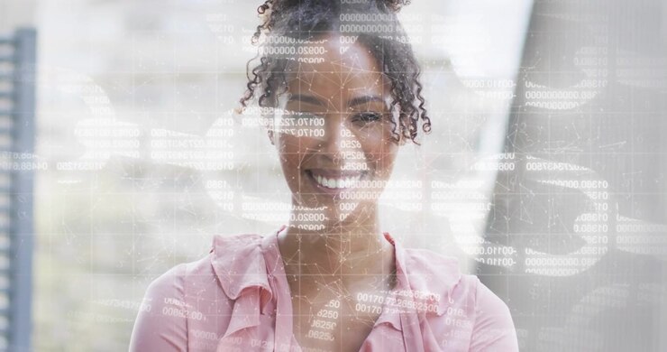 Woman standing before city window at start, digital overlay fading visualizing technology data flow