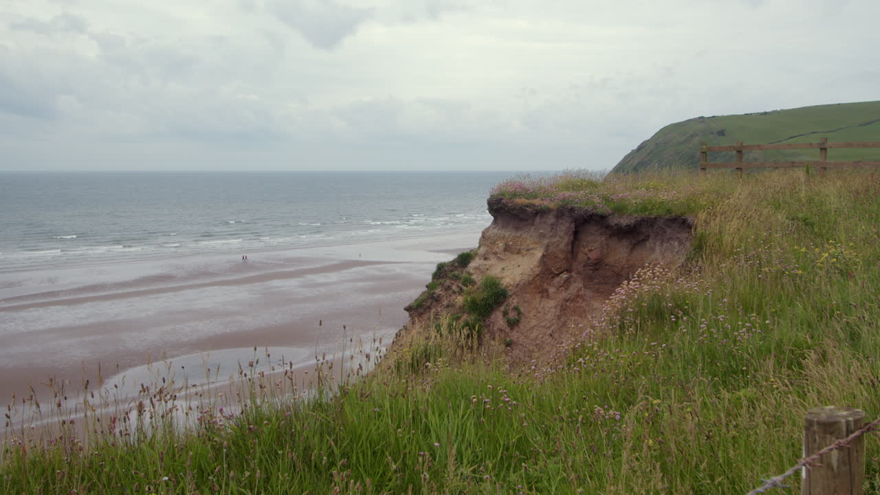 Wide shot of coastal erosion of the cliffs at St bees