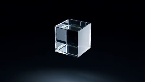 transparent glass cube on dark background