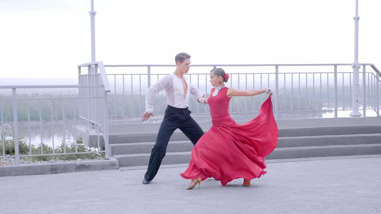 Couple Performing Ballroom Dance Outdoors