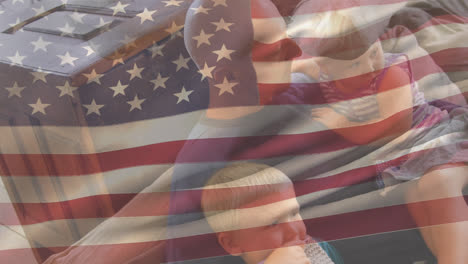 caucasian family with us flag waving foreground