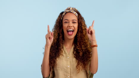 Studio-woman,-happy-dance-and-pointing-up