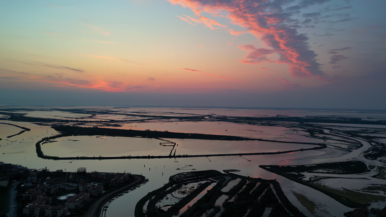 Aerial drone view of the Venetian Lagoon at sunset, near Cavallino-Treporti in northern Italy