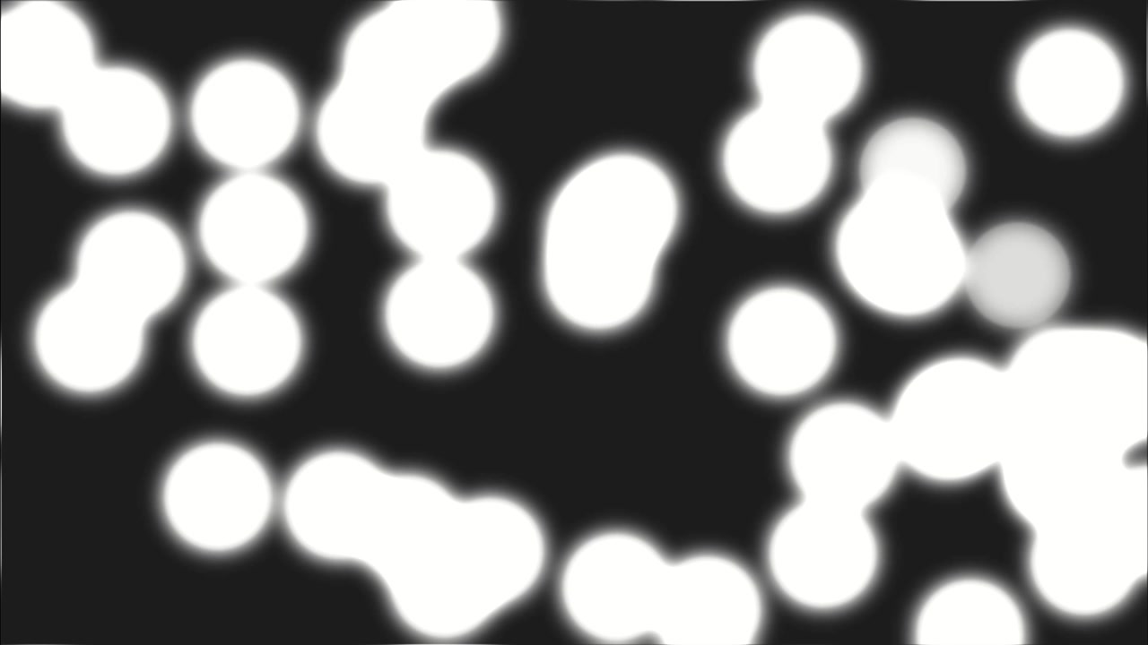 Sfere di luce bokeh bianche e luminose che tremolano su sfondo nero in un loop di animazione 3D continuo