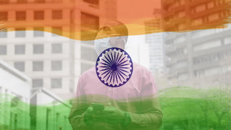 composición de un hombre con una máscara facial en la calle sobre la bandera de la india