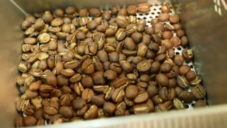 footages of the processes of coffee roasting with the coffee roaster