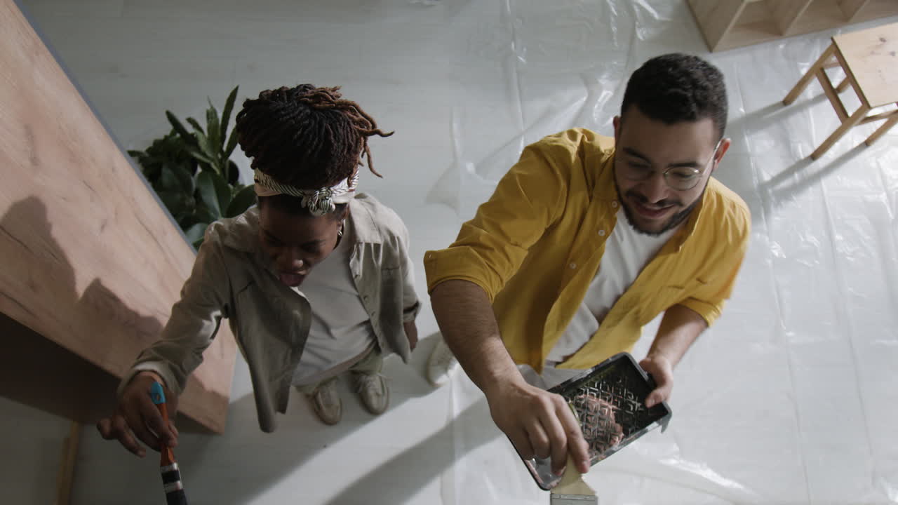 Couple Painting Furniture