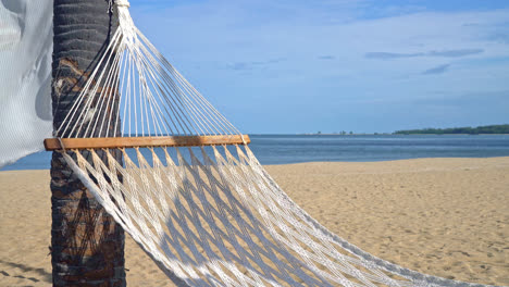 empty cradle with sea beach background