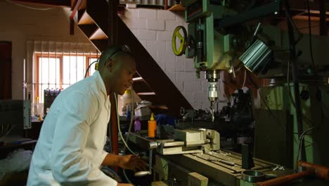 male worker working in glass factory 4k